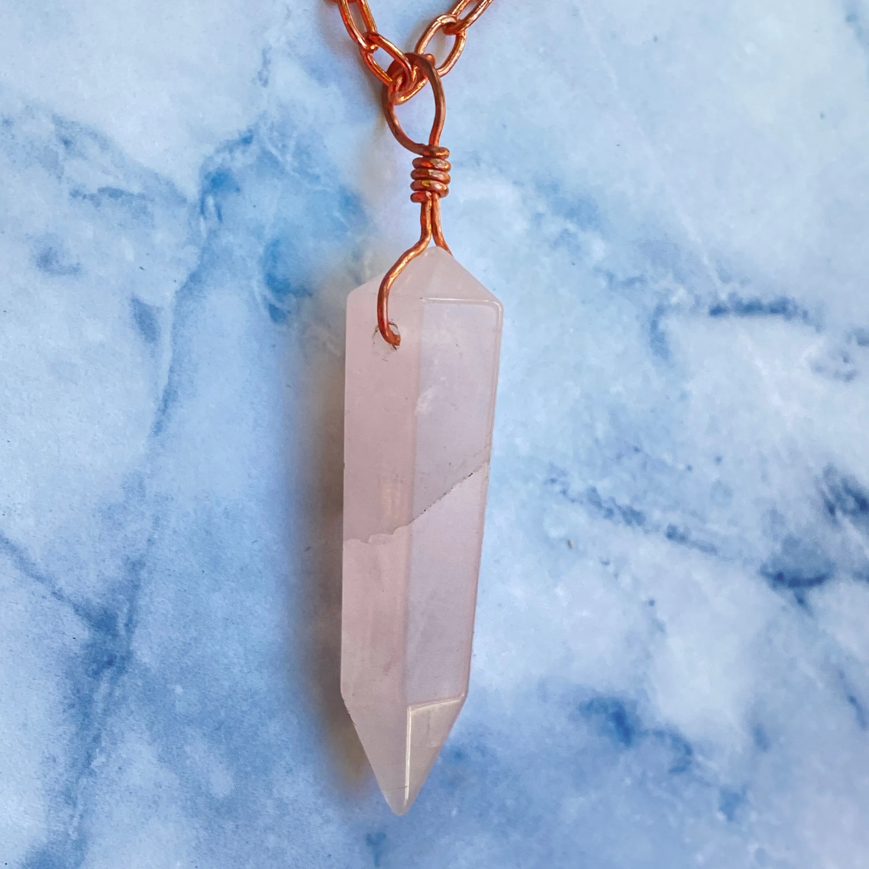 Rose quartz pendant on copper chain necklace