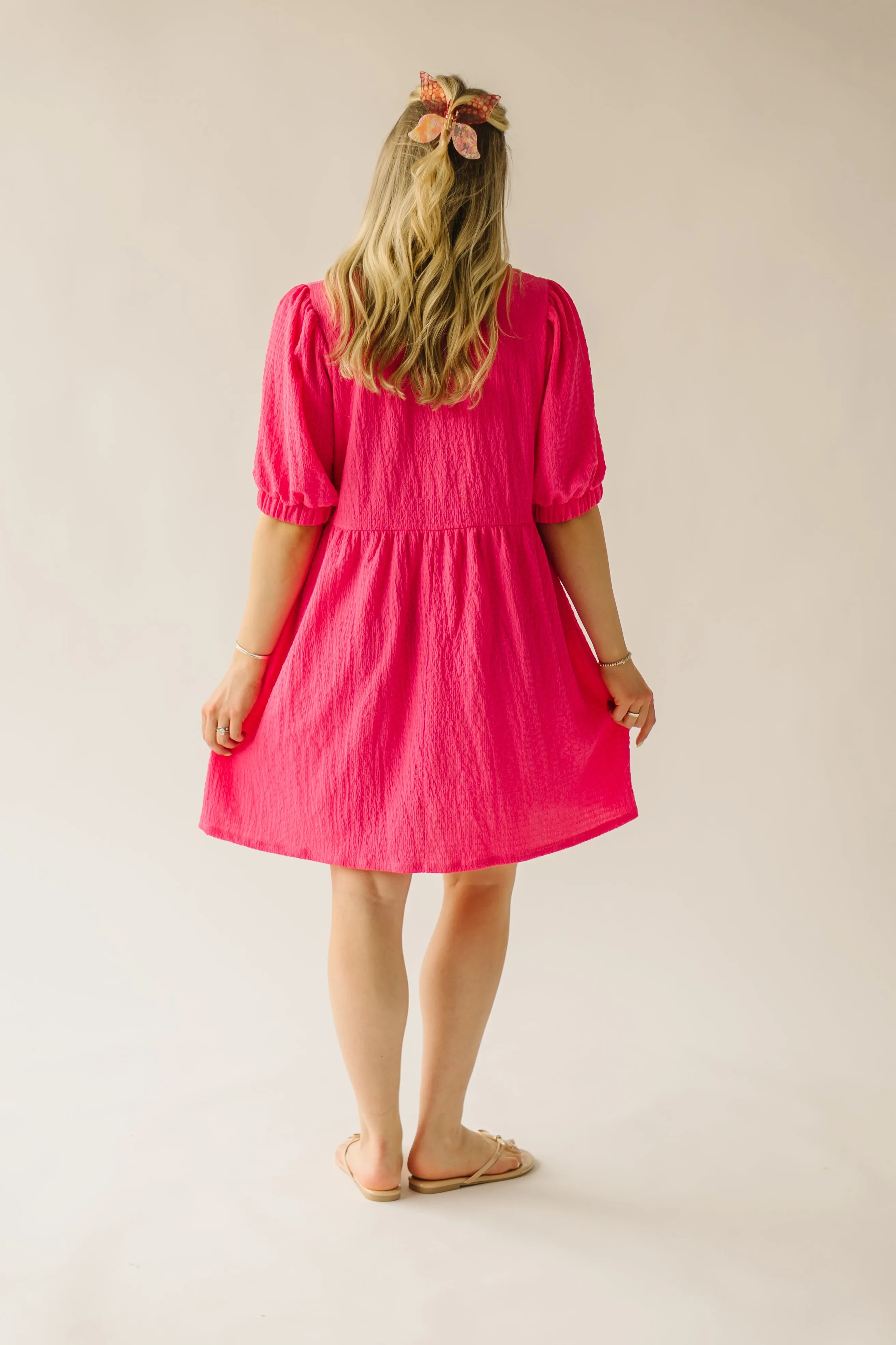 The Moralez Textured Puff Sleeve Dress in Fuchsia