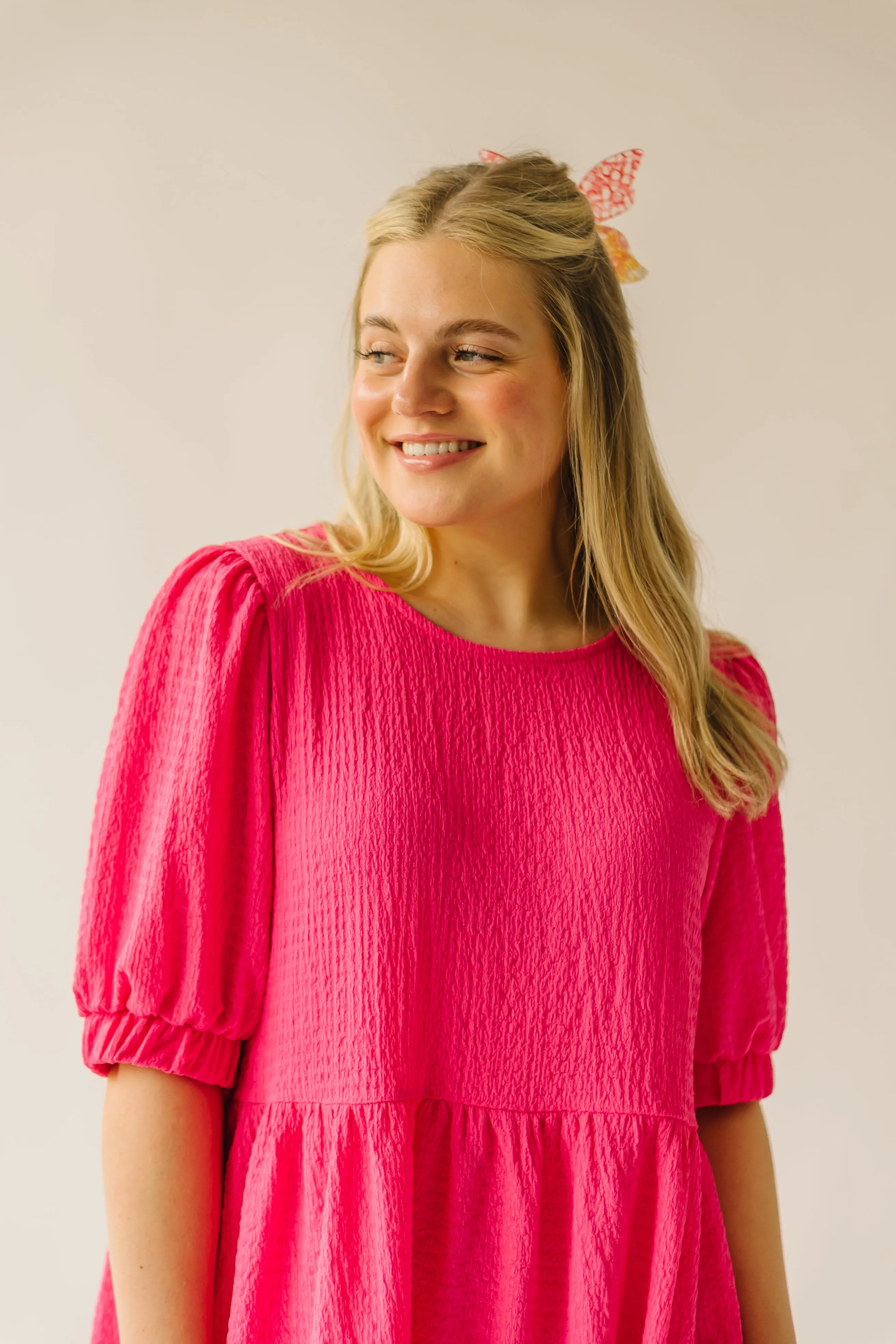 The Moralez Textured Puff Sleeve Dress in Fuchsia